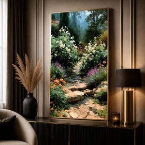 May include: A vertical framed wall art print depicting a stone pathway winding through a lush garden filled with white roses, orange flowers, and purple lavender bushes under a soft, hazy sky, rendered in a painterly style with visible brushstrokes.