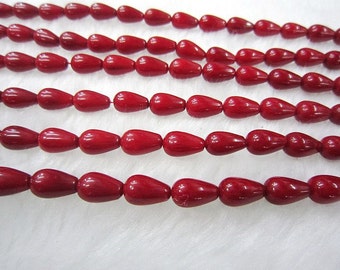 red coral teardrop  bead 9x6mm 15 inch strand