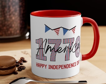 Beautiful ceramic mug featuring 1776 and Happy Independence Day. Multiple color options. Perfect patriotic gift this 4th of July. Size 11oz