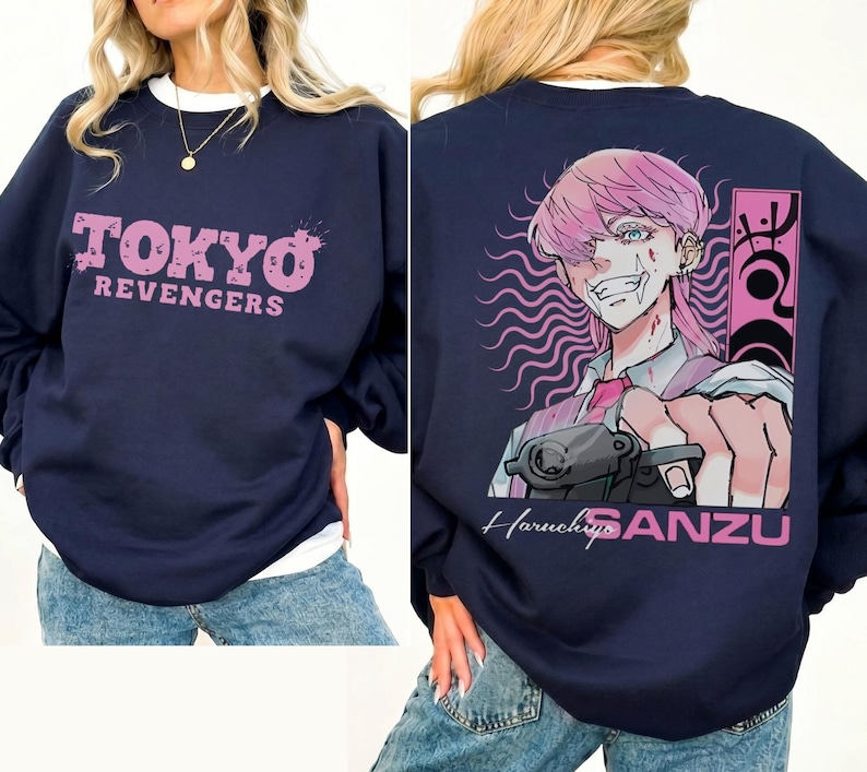 May include: Navy blue sweatshirt with the text "TOKYO REVENGERS" in pink on the front. The back features an anime illustration of a character with pink hair and the name "Haruchiyo SANZU".