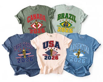 T-shirt personnalisé Monde des États-Unis 2026, T-shirt de fan de football Comfort Colors®, T-shirt de la Coupe de football du Monde 2026 États-Unis Canada Mexique