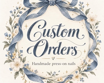 May include: A circular graphic featuring the text Custom Orders and Handmade press-on nails in dark blue script and serif fonts. The design is framed by a blue ribbon bow at the top and a wreath of white flowers, green leaves, and blue berries.