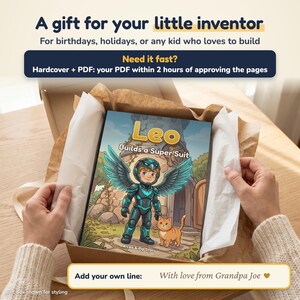 May include: A hardcover book titled Leo Builds a Super Suit featuring an illustration of a child in a blue mechanical suit with wings standing next to an orange cat, presented in a cardboard gift box with white tissue paper.