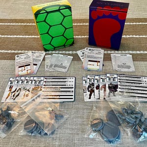 Les deux kits d'extension Foot Clan et Teenage Mutant Ninja Turtles pour Marvel Crisis Protocol