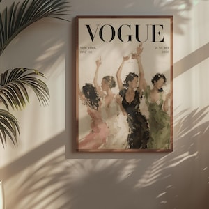 May include: A framed Vogue magazine cover print featuring a watercolor painting of four women in dresses, with the magazine's logo and issue details. The print is displayed on a wall next to a potted plant.