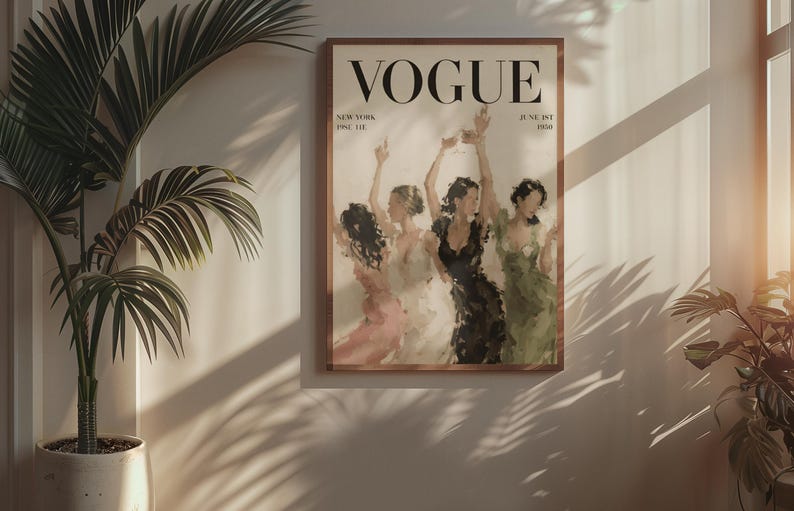 May include: A framed Vogue magazine cover print featuring a watercolor painting of four women in dresses, with the magazine's logo and issue details. The print is displayed on a wall next to a potted plant.