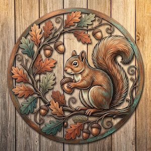May include: A circular metal wall art piece featuring a squirrel holding an acorn, surrounded by oak leaves and acorns. The design has a weathered copper and bronze finish with orange, brown, and teal tones, set within a circular frame.