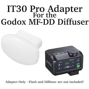 May include: The IT30 Pro Adapter for the Godox MF-DD Diffuser includes a white, rounded plastic diffuser attachment and a black electronic control unit with a digital display screen, control buttons, and a dial, labelled with Godox and IT30 Pro.