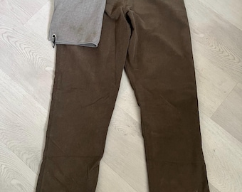 Pantalones de golf TeeBag con accesorio para toalla de golf.