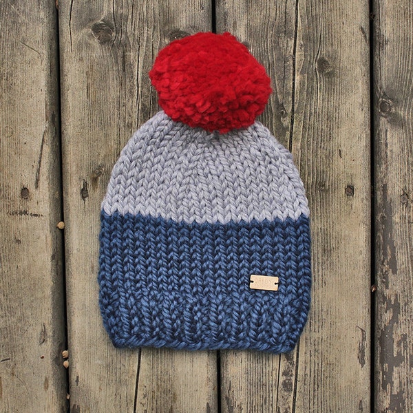 Blue and Grey colorblock chunky knit kid's size hat with Bright Red pompom