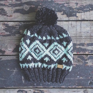 The Nazca Hat grey and aqua fair-isle knit hat with pom-pom image 2