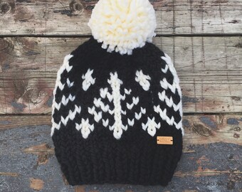 the Pines hat - Black chunky knit hat with cream fair-isle pattern and jumbo pompom