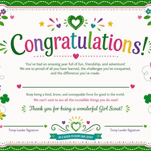 May include: A white Girl Scout certificate with a green scalloped border, featuring colorful floral and heart illustrations. The text reads: Congratulations! You've had an amazing year full of fun, friendship, and adventure! Thank you for being a wonderful Girl Scout!