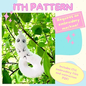 May include: A white plush worm-like creature keychain with large black and white eyes and small stitched limbs. The image includes the text ITH PATTERN, Requires an embroidery machine!, and Includes ITH embroidery files and instruction PDF!