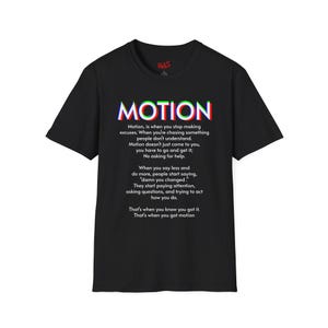 May include: A black short-sleeve t-shirt featuring the word MOTION in a red, blue, and green glitch effect font at the top. Below the title, white text displays a paragraph about motion, excuses, and change. The brand logo RAS is in red at the neck.