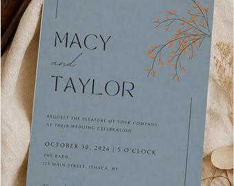 May include: A dusty blue wedding invitation with the names "Macy and Taylor" in elegant script. The invitation includes the wedding date, time, and location, with an orange floral design. The text "Editable in Canva" is also present.