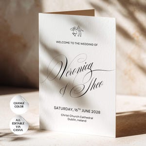 Könnte beinhalten: Eine weiße, gefaltete Hochzeitseinladungskarte mit einer schwarzen Strichzeichnung eines tanzenden Paares, dem Text "WELCOME TO THE WEDDING OF", den Namen "Veronica & Theo" in eleganter Schrift und dem Datum "SATURDAY, 16TH JUNE 2028" mit Ortsangabe.