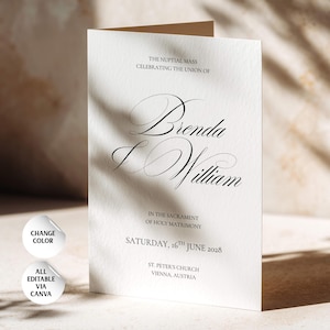 Puede incluir: Un programa de boda blanco plegado con texto negro que dice: THE NUPTIAL MASS CELEBRATING THE UNION OF Brenda & William IN THE SACRAMENT OF HOLY MATRIMONY SATURDAY, 16TH JUNE 2028 ST. PETER'S CHURCH VIENNA, AUSTRIA. Se incluyen dos iconos circulares.