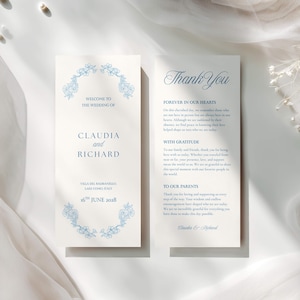 Puede incluir: Dos tarjetas de programa de boda verticales en papel crema con texto azul y detalles florales. La tarjeta izquierda dice Welcome to the wedding of Claudia and Richard, Villa del Balbianello, Lake Como, Italy, 16th June 2028. La derecha dice Thank You.
