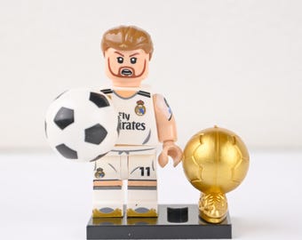 Miniatura do Gareth Bale, do Real Madrid, número 11, com o troféu da Copa do Mundo da FIFA. Herói galês em exposição. Presente de aniversário para fãs de futebol.
