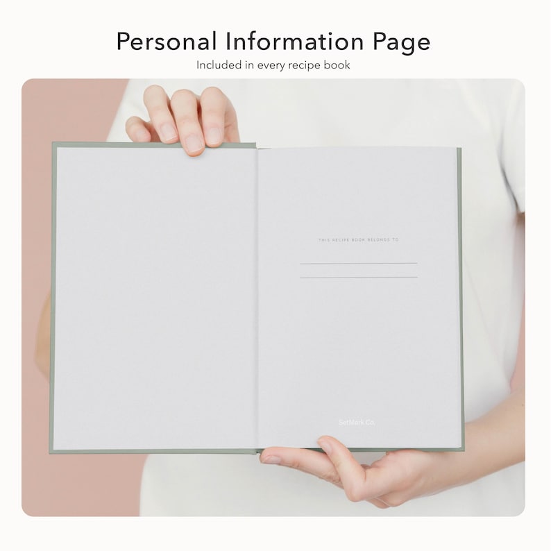May include: Open recipe book with a light green cover, displaying a personal information page. The text "Personal Information Page" and "Included in every recipe book" are visible at the top. The book is held open by a person.