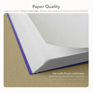 May include: An open book with white pages and a purple spine. The text "Paper Quality" is at the top. The text "Pages are printed on 80 gsm coated paper, offering a clean, professional look and a smooth writing feel" is also visible.