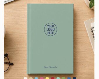 Cuaderno personalizado con logotipo, libreta con nombre, nombre de la empresa, páginas en blanco con cuadrícula de puntos y renglones.