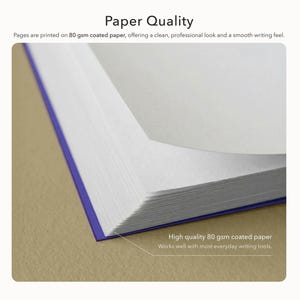 Puede incluir: Un libro abierto con p&aacute;ginas blancas y lomo morado. El texto "Paper Quality" est&aacute; en la parte superior. La imagen destaca la calidad del papel, que es papel estucado de 80 g/m&sup2;, ofreciendo un aspecto limpio, profesional y una sensaci&oacute;n de escritura suave.