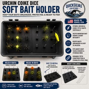 May include: A black rectangular soft bait holder for fishing lures, featuring a grid of vertical stainless steel pins to organize urchin and coike-style baits. The unit includes a base, storage rods, and text detailing its capacity and features.