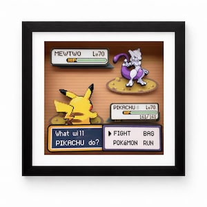 May include: A framed artwork featuring a pixelated battle scene from the Pokémon video game. Pikachu faces Mewtwo, with text boxes displaying game options and character stats. The artwork is in a black frame.