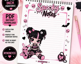May include: A spiral-bound notepad featuring the text Spooky Notes at the top, decorated with pink and black skulls, bats, and hearts. A cartoon character with black hair and a pink streak sits next to a pink rabbit plush and a heart-shaped padlock.