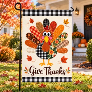 May include: A rectangular garden flag featuring a central turkey illustration with multicolored patterned feathers, including plaid and floral designs. The flag has a black and white buffalo check border and the text Give Thanks in black script.