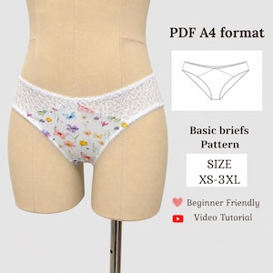 May include: Briefs featuring a white lace waistband and a floral butterfly print on the front. Text includes PDF A4 format, Basic briefs Pattern, SIZE XS-3XL, Beginner Friendly, and Video Tutorial with a heart and play button icon.