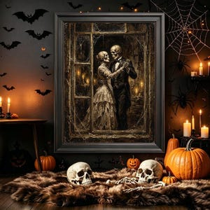 May include: A framed wall art print depicting a skeleton couple in formal attire dancing inside a window frame. The artwork features a dark, moody aesthetic with cobwebs and warm candlelight, presented in a black frame on a dark wall.