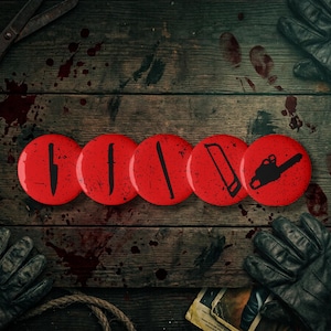 May include: Five circular red buttons arranged in a horizontal row, each featuring a black silhouette of a different tool: a chef knife, a dagger, a machete, a handsaw, and a chainsaw, all set against a dark, weathered wooden background.