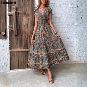 bohemian vintage dresses Earthy Solstice Boho Bell Sleeve Maxi Dress Regular shoulder neckline adds a touch of romance Floral Vintage Irregular Maxi Dress