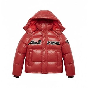 May include: A red puffer jacket with a hood. The jacket features the text "Avi Rex" in black and white on the front. The jacket has a glossy finish and a black and red striped cuff.