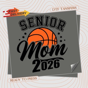 May include: A gray square graphic design featuring the text SENIOR in black block letters, a basketball illustration in orange and black, the word Mom in black script, and the number 2026 in black. Small black stars surround the basketball.