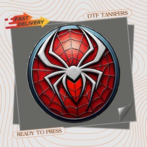 May include: A circular DTF transfer featuring a stylized silver spider emblem centered over a red and black web pattern. The design includes the text FAST DELIVERY, DTF TANSFERS, and READY TO PRESS. The graphic has a metallic finish and a dark border.