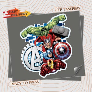 May include: A DTF transfer sheet featuring a graphic illustration of Marvel characters including the Hulk, Thor with his hammer, Captain America with his shield, and Iron Man, arranged above a large silver Avengers logo on a gray background.