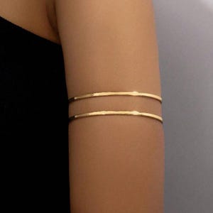 Bracelet creux géométrique en métal élégant, extravagant et unique, manchette en or avec chaînes, bracelet bohème sur le bras pour femme