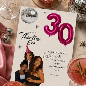 May include: A rectangular birthday invitation card featuring a large magenta balloon shaped as the number 30, a silver disco ball, and star icons. The text reads In My Thirties Era, Come Celebrate Layla's 30th, Sat 29 August, 7:30pm, The Attium Bar, Perth, and RSVP Kelly 0400000000.