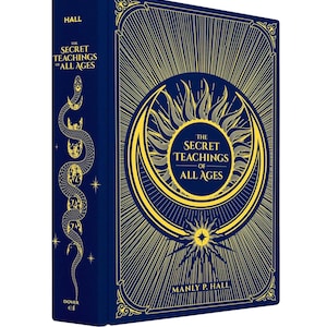 May include: A hardcover book titled "The Secret Teachings of All Ages" by Manly P. Hall. The book has a dark blue cover with gold-colored illustrations, including a sunburst design and a serpent. The spine features a serpent illustration and the word "HALL".