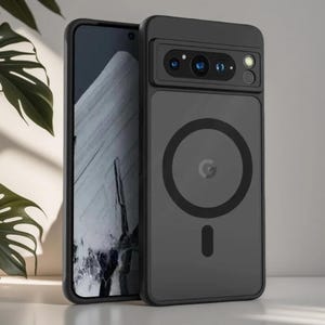 May include: A matte black smartphone case featuring a raised camera bar with three circular lenses and a flash. The back of the case displays a prominent black circular magnetic ring alignment guide and a small Google logo in the center.