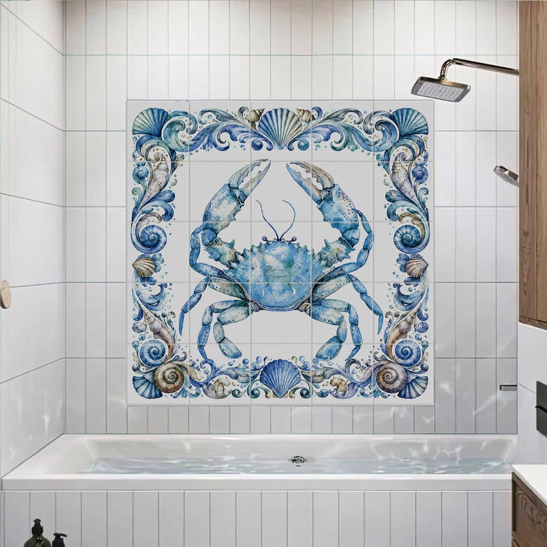 Ceramic tile featuring a watercolor blue crab surrounded by ornate seashell border and coastal ocean details for bathroom or beach house decor