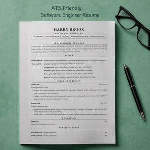 May include: A white software engineer CV template with black text, featuring sections for professional summary, skills, work experience, education, and certifications. The document is accompanied by black-rimmed glasses and a black ballpoint pen.