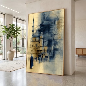 May include: A large rectangular wall art piece featuring a blue and gold architectural sketch of a mosque with a prominent dome and minaret. The composition includes a lone figure in a dark coat standing in the foreground, with a crowd of people visible in the distance, all set against a grid-like technical drawing background.