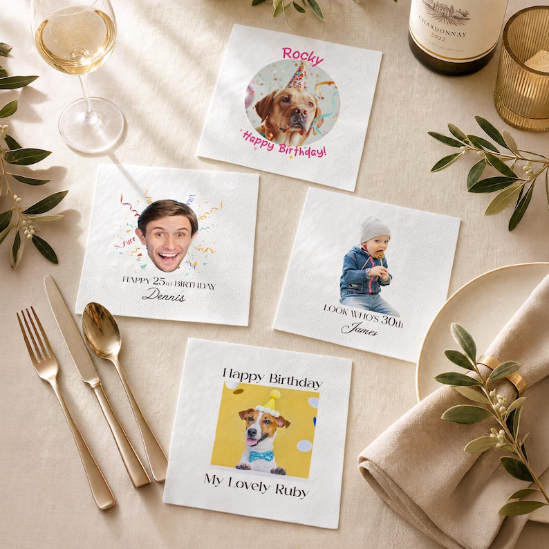Puede incluir: Cuatro servilletas blancas personalizadas con fotos y texto para una celebraci&oacute;n de cumplea&ntilde;os. Una servilleta presenta un perro con un gorro de fiesta y el texto "Happy Birthday!" y "My Lovely Ruby". Otras servilletas tienen fotos de una persona y un ni&ntilde;o.