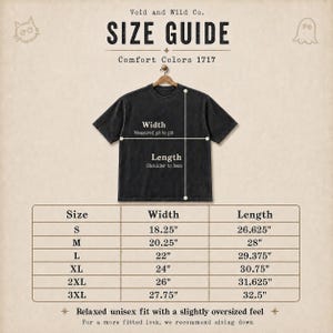 May include: A size guide chart for a Comfort Colors 1717 t-shirt by Void and Wild Co. The graphic displays a black t-shirt on a hanger with width and length measurement lines. A table lists sizes S through 3XL with corresponding measurements in inches.
