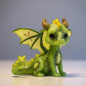 May include: A whimsical green dragon figurine crafted to resemble a kiwi fruit. The dragon features kiwi-slice wings, a yellow crest, and brown horns. Its body is detailed with kiwi fruit patterns, creating a unique and playful decorative item.